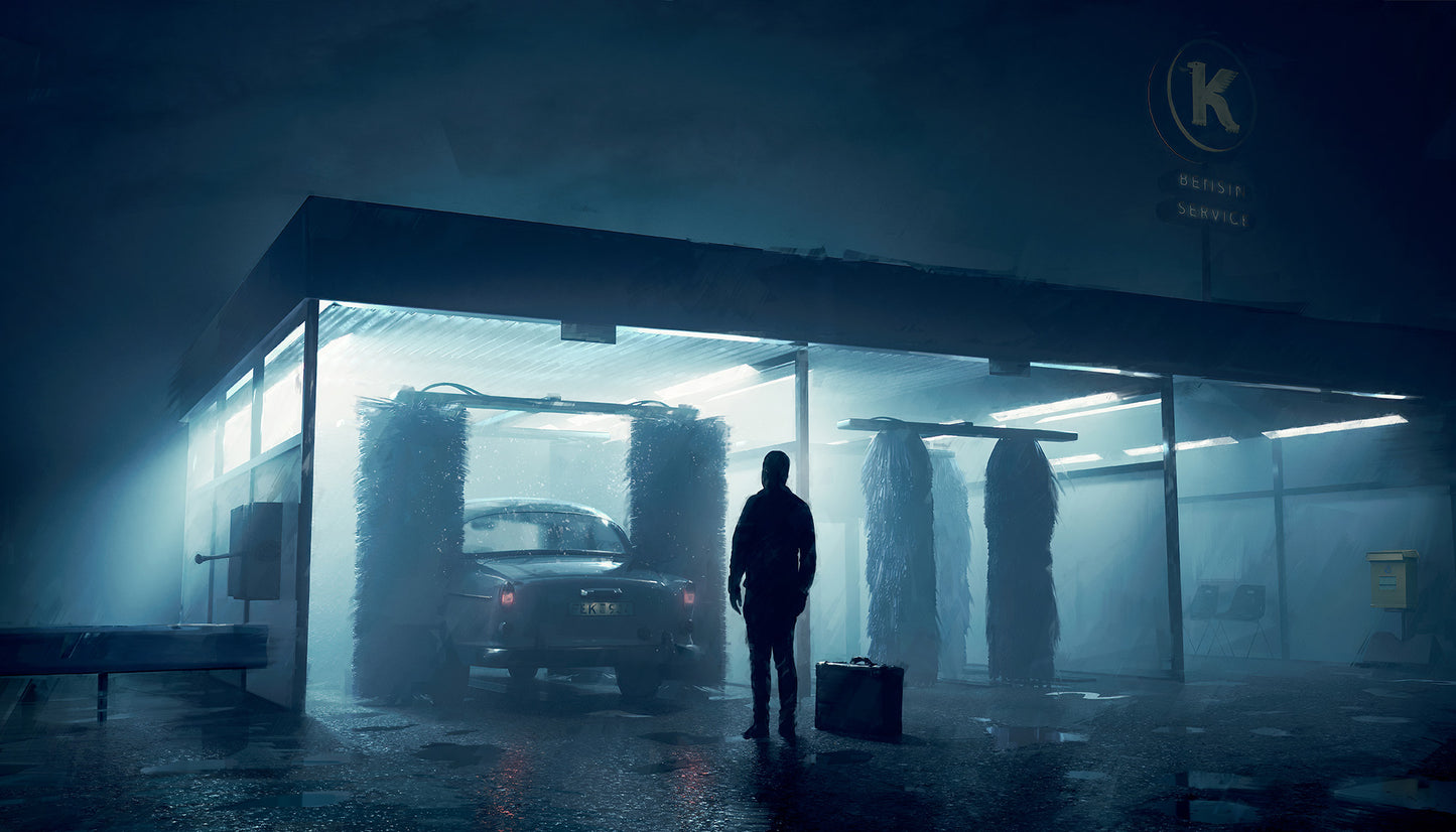 Person with a suitcase standing in front of a carwash on a foggy night.